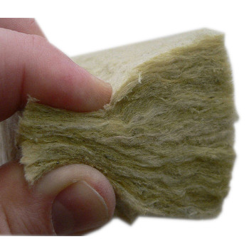 stone wool insulation ghold in hand